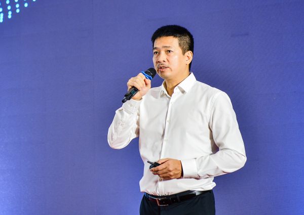 Phó Chủ tịch Thường trực Hiệp hội Blockchain Việt Nam Phan Đức Trung trình bày tham luận tại hội thảo - ảnh: Thanh Chi 